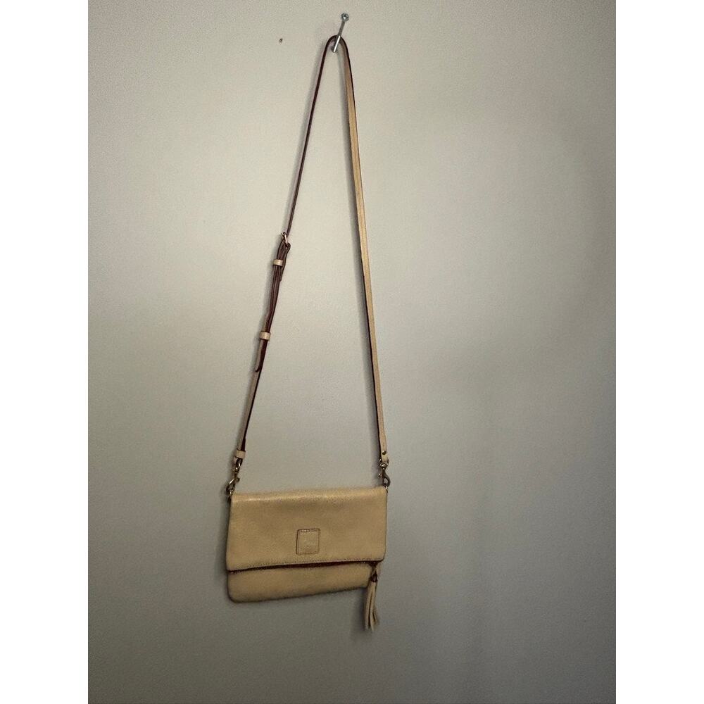Dooney & Bourke Fold over zip cross body, small. White, Ivory